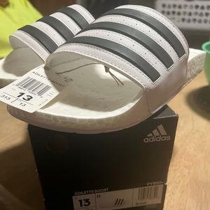 Adidas sandals brand new in the box mens size 13 still have the tags on them.